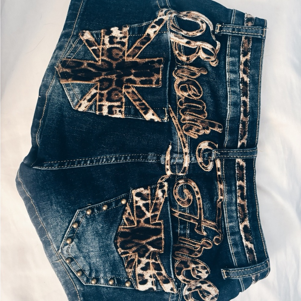 Stylish Blue Denim Jeans with Leopard Print Accents